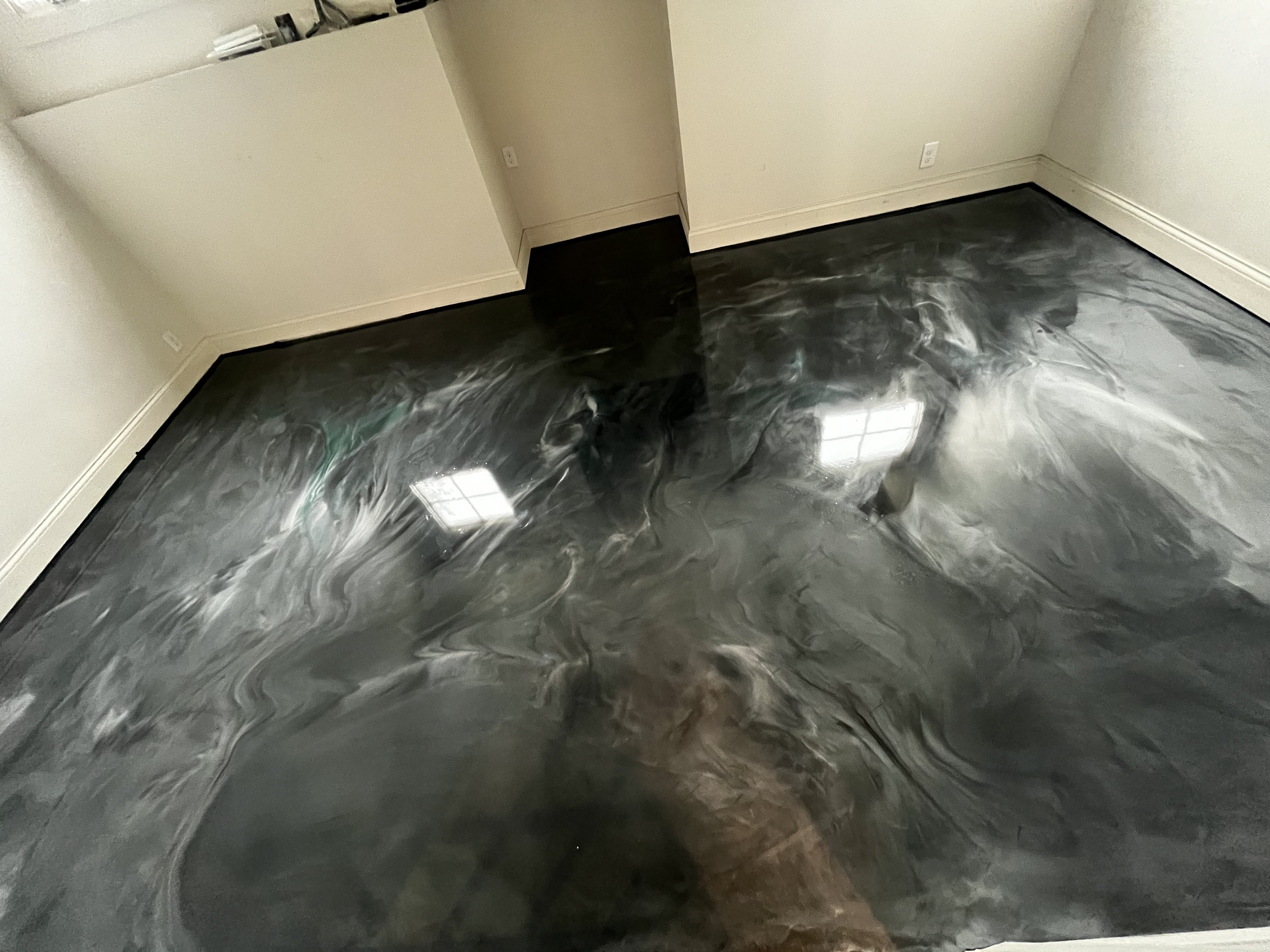 Black and silver metallic epoxy floor